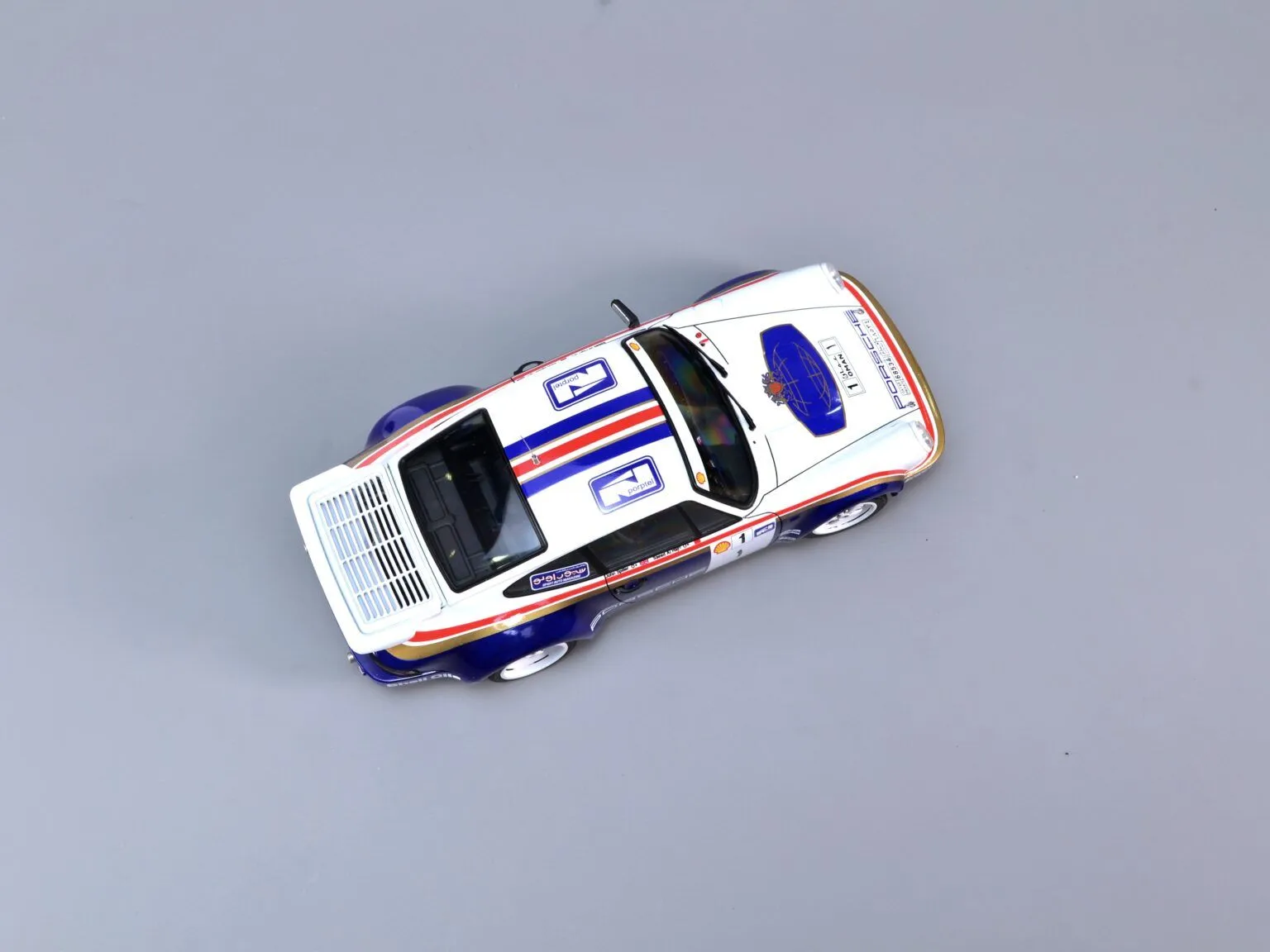 NUNU 1/24 Porsche 911 SC RS Oman 1984 Winner # 24011 11 NUNU 1/24 Porsche 911 SC RS Oman 1984 Winner # 24011 - Image 9